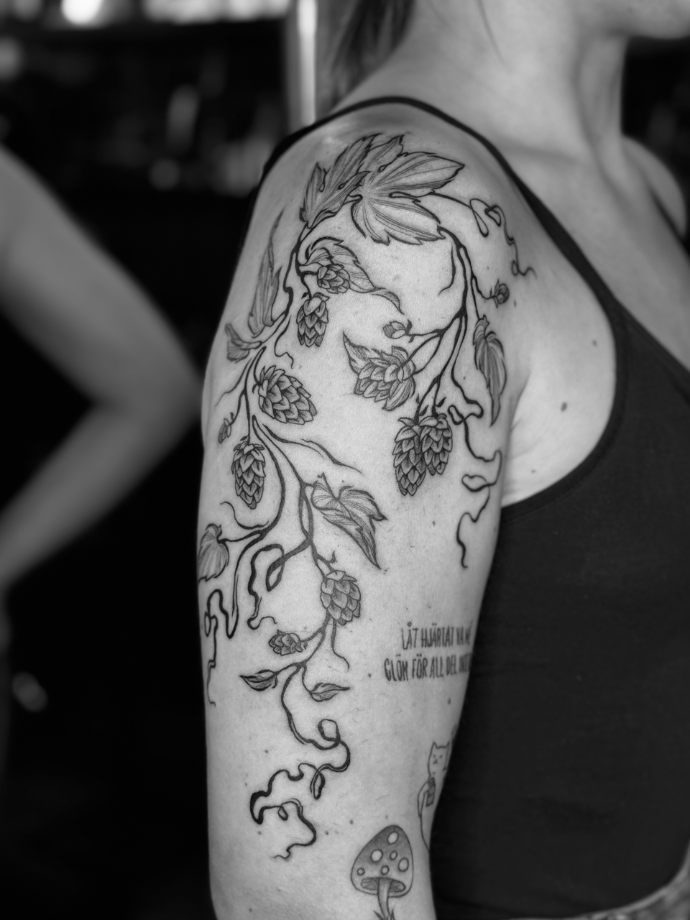 hops tattoo in bold flow style