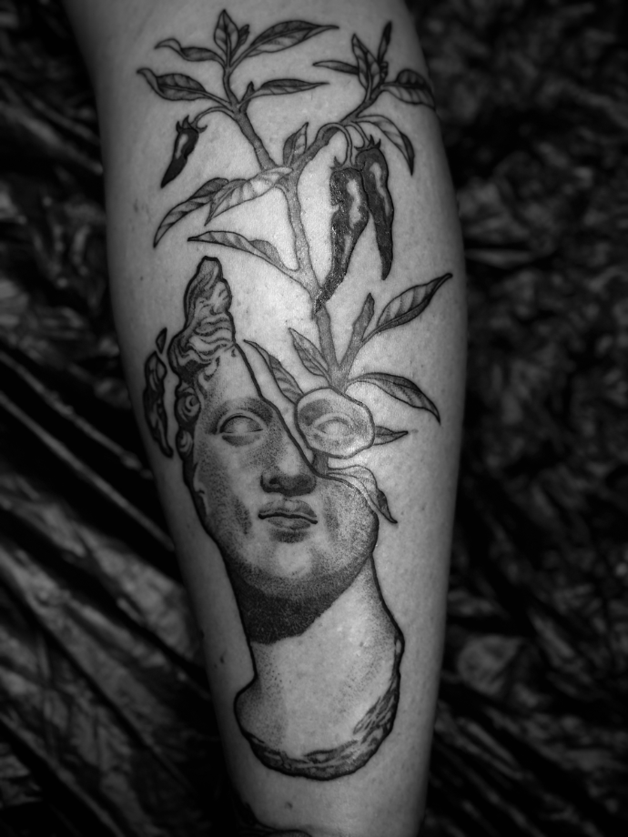 goddess tattoo with botanical elements. 